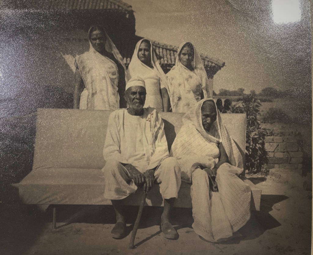 100 year old family photo of an old Indian man and his wife , paintphotographs
